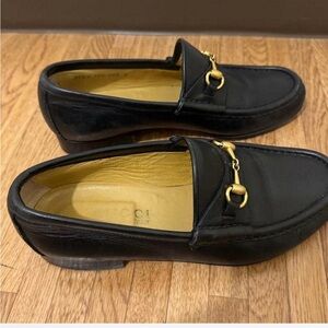 Gucci Black Leather Loafers with Gold Accents